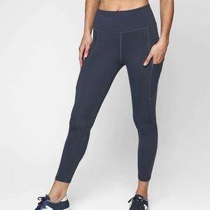 Athleta Navy All In 7/8 tights in size medium